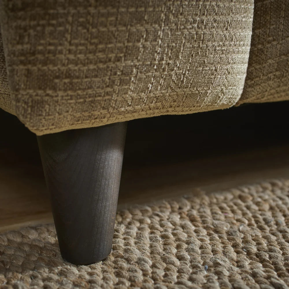 Sofa legs and lower frame with textured olive-brown upholstery
