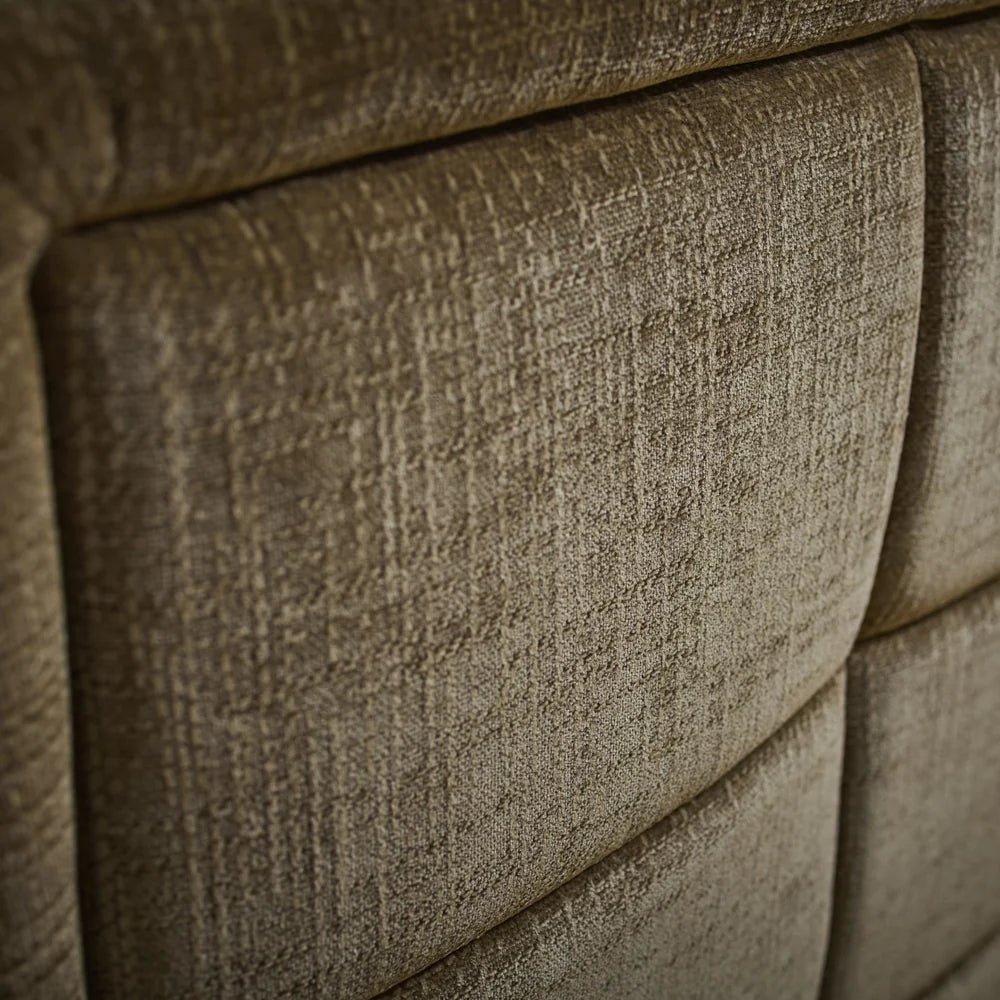 Sofa upholstery close-up in textured olive-brown fabric