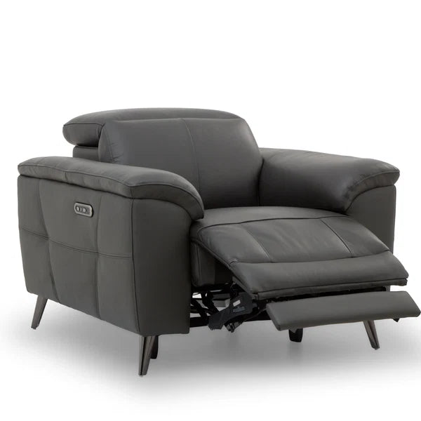 A dark gray leather recliner armchair shown with the seat and footrest extended, photographed on a clean white studio background. Interior Envy